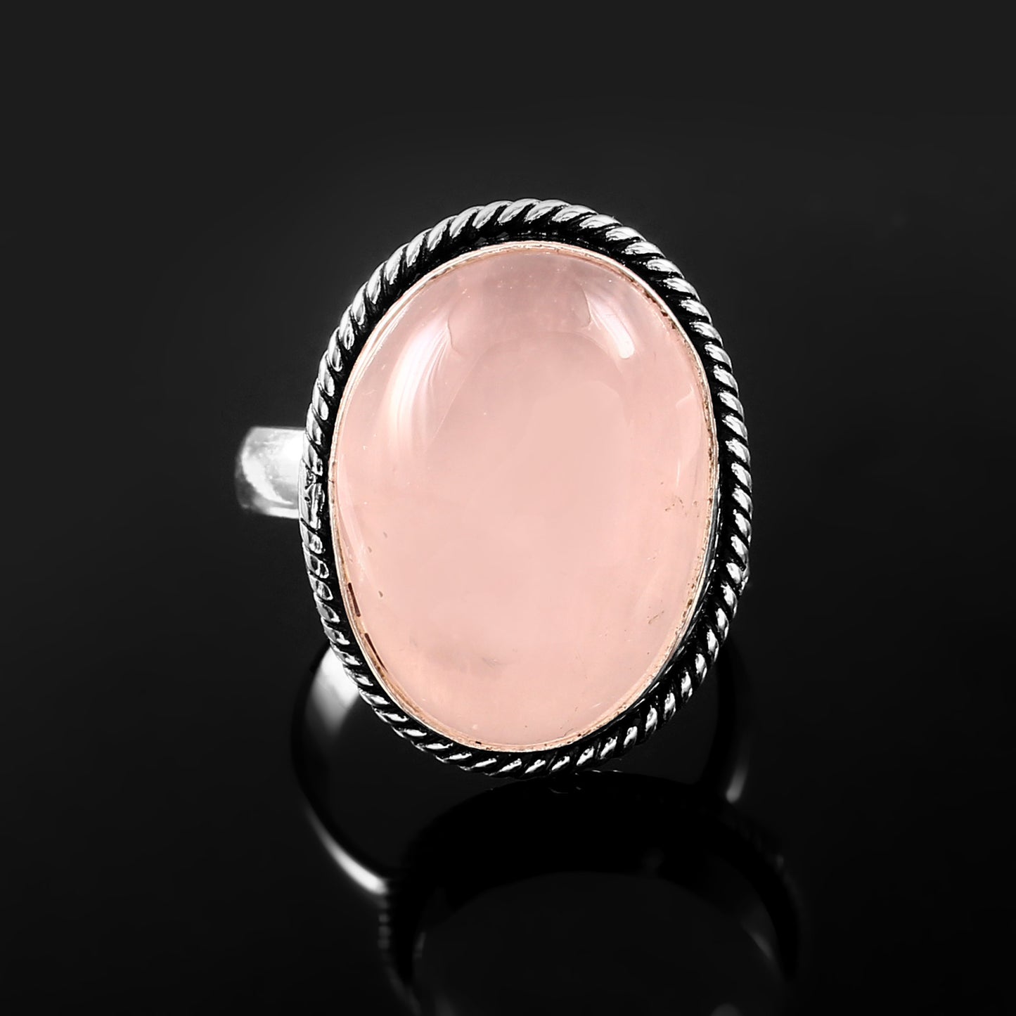 Elegant German silver rose quartz jewelry ring with a large oval rose quartz gemstone