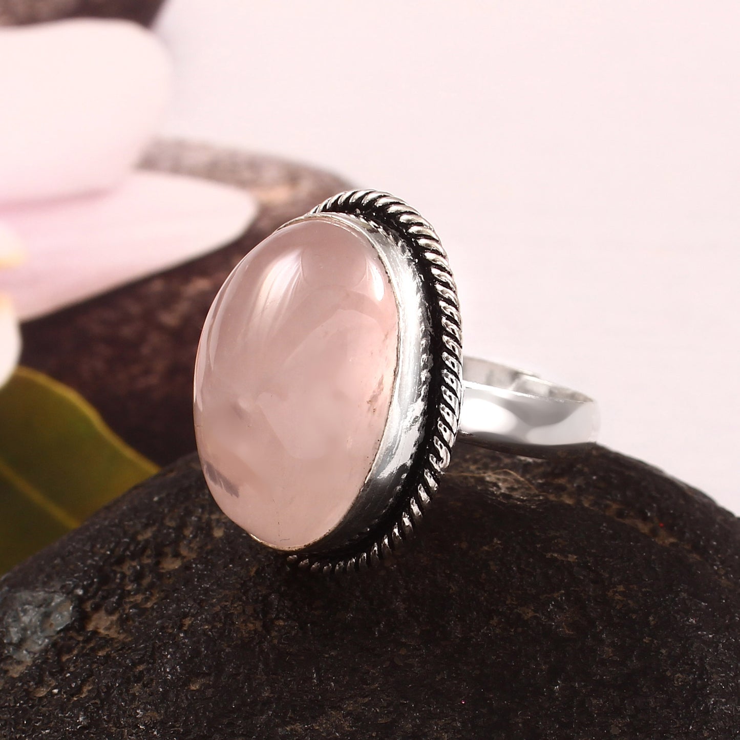 Elegant German silver rose quartz jewelry ring featuring a large oval rose quartz gemstone