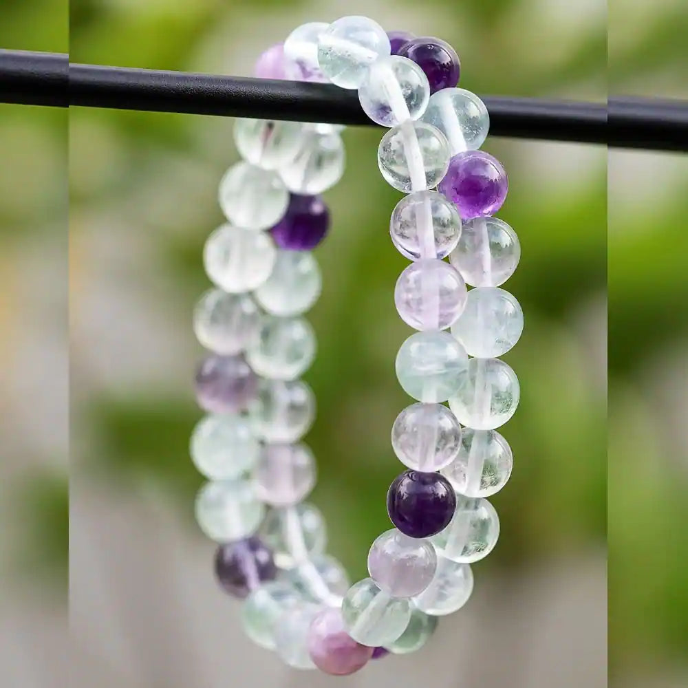 CRYSTCOP multi fluorite bracelet 8mm with polished translucent purple and clear round beads