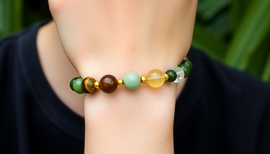 Close-up of a wrist wearing a colorful beaded money magnet bracelet showing money magnet bracelet benefits
