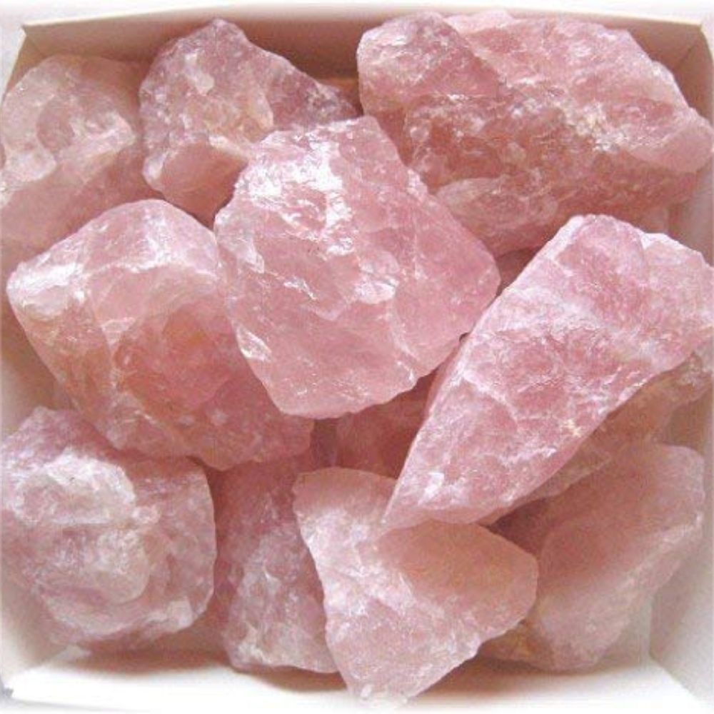 Natural raw rose quartz crystals in a box to buy rose quartz online for healing and decor