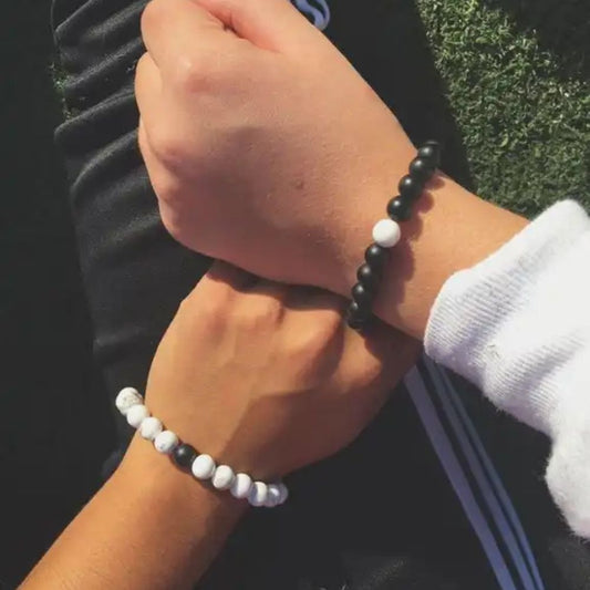 CRYSTCOP couple bracelets set featuring matching black and white beads for couples